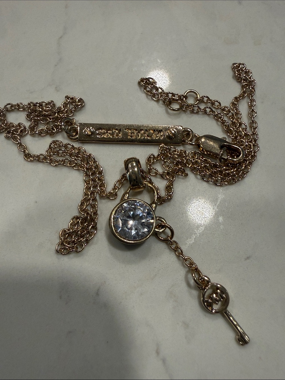 Sparkling Rose Gold Key Pendant Necklace with Crystal Accent